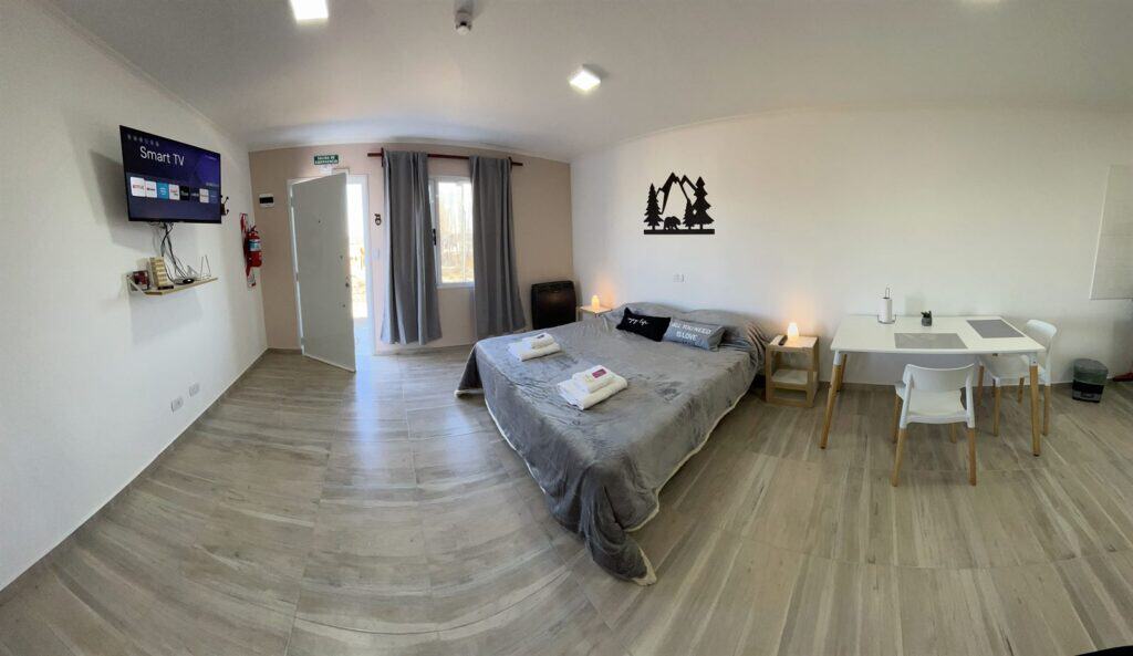 Living comedor con TV — Aparts Mundo Austral, El Calafate